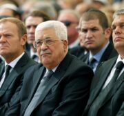 Palestinian President Mahmoud Abbas (C) sits alongside European Council President Donald Tusk (L) as they attend the funeral of Shimon Peres, 93, on Mount Herzl Cemetery in Jerusalem, September 30, 2016. REUTERS/Abir Sultan/Pool