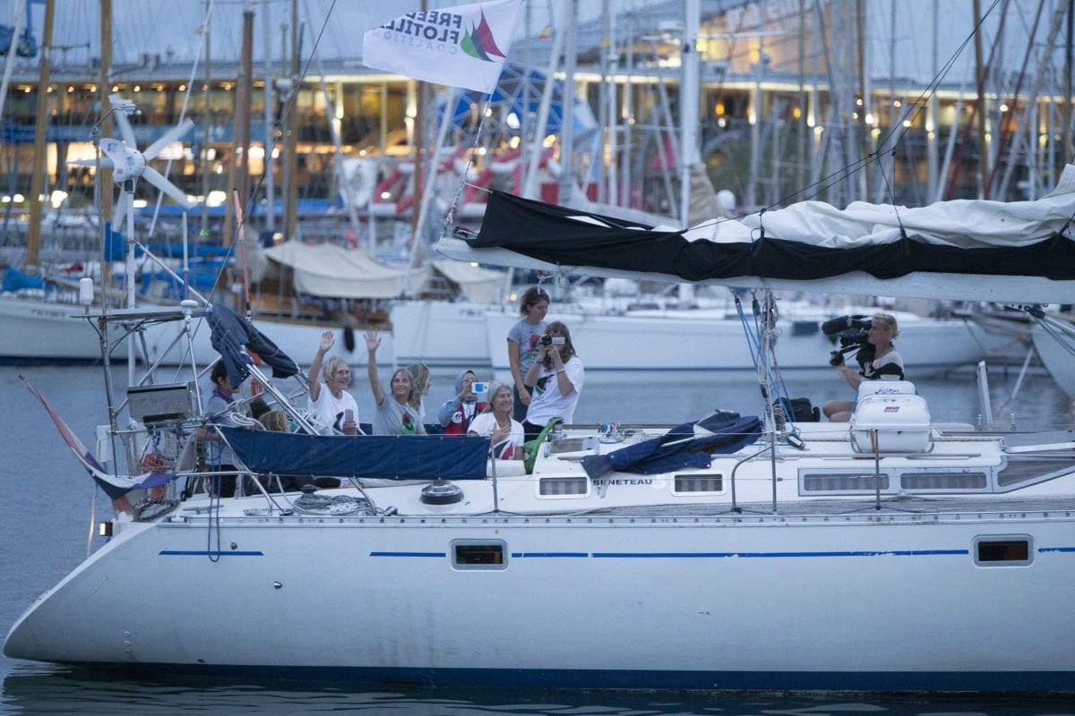 Activists of Two sailing boats, Amal-Hope and Zaytouna-Oliva, with only female activists on board, make preparations before set off for the Gaza Strip from the port of Barcelona under the banner "The Women's Boat to Gaza" to break the Israeli blockade on Gaza on 14 September, 2016 in Barcelona, Spain [Albert Llop/Anadolu Agency]