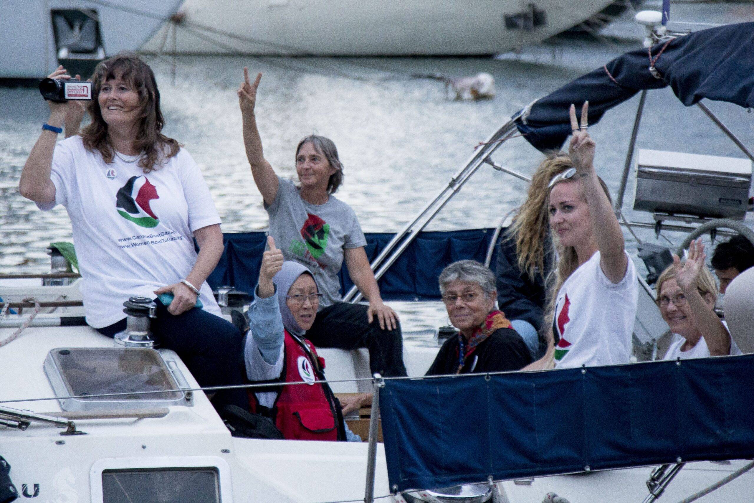 Activists of Two sailing boats, Amal-Hope and Zaytouna-Oliva, with only female activists on board, make preparations before set off for the Gaza Strip from the port of Barcelona under the banner "The Women's Boat to Gaza" to break the Israeli blockade on Gaza on 14 September, 2016 in Barcelona, Spain [Albert Llop/Anadolu Agency]