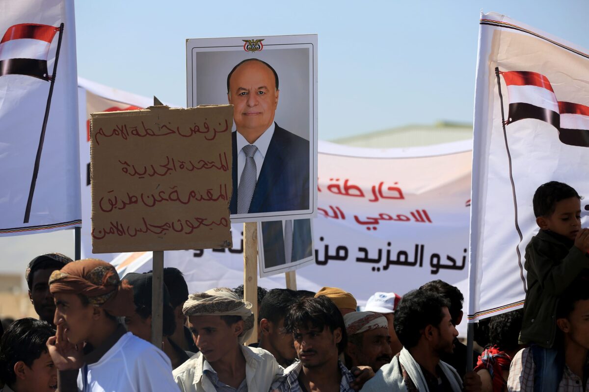 Supporters of Legal Government hold the portraits of Yemeni President Abd Rabbuh Mansur Hadi  in Yemen on 3 November, 2016 [Ali Owidha /Anadolu Agency]