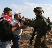 JERICHO, WEST BANK: Israeli security forces intervene Palestinian protesters with real and plastic bullets and tear gas during a demonstration at the symbolic region named 'Yasser Arafat Village' in Al-Agvar region of Jericho, West Bank on November 17, 2016. ( Issam Rimawi - Anadolu Agency )