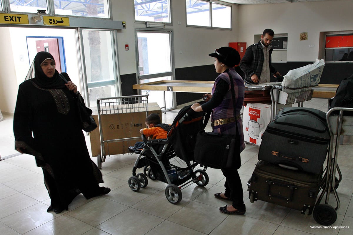 Image of Palestinians at the Rafah border as Egypt reopened the border enabling people to cross freely for the first time in four years on May 28 2011 [Naaman Omar/Apaimages]