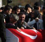 Relatives attend the funeral ceremony for the casualties of the Istanbul terror attacks at Istanbul Police Department headquarters in Istanbul, Turkey on December 11, 2016 [Arif Hüdaverdi Yaman / Anadolu Agency]