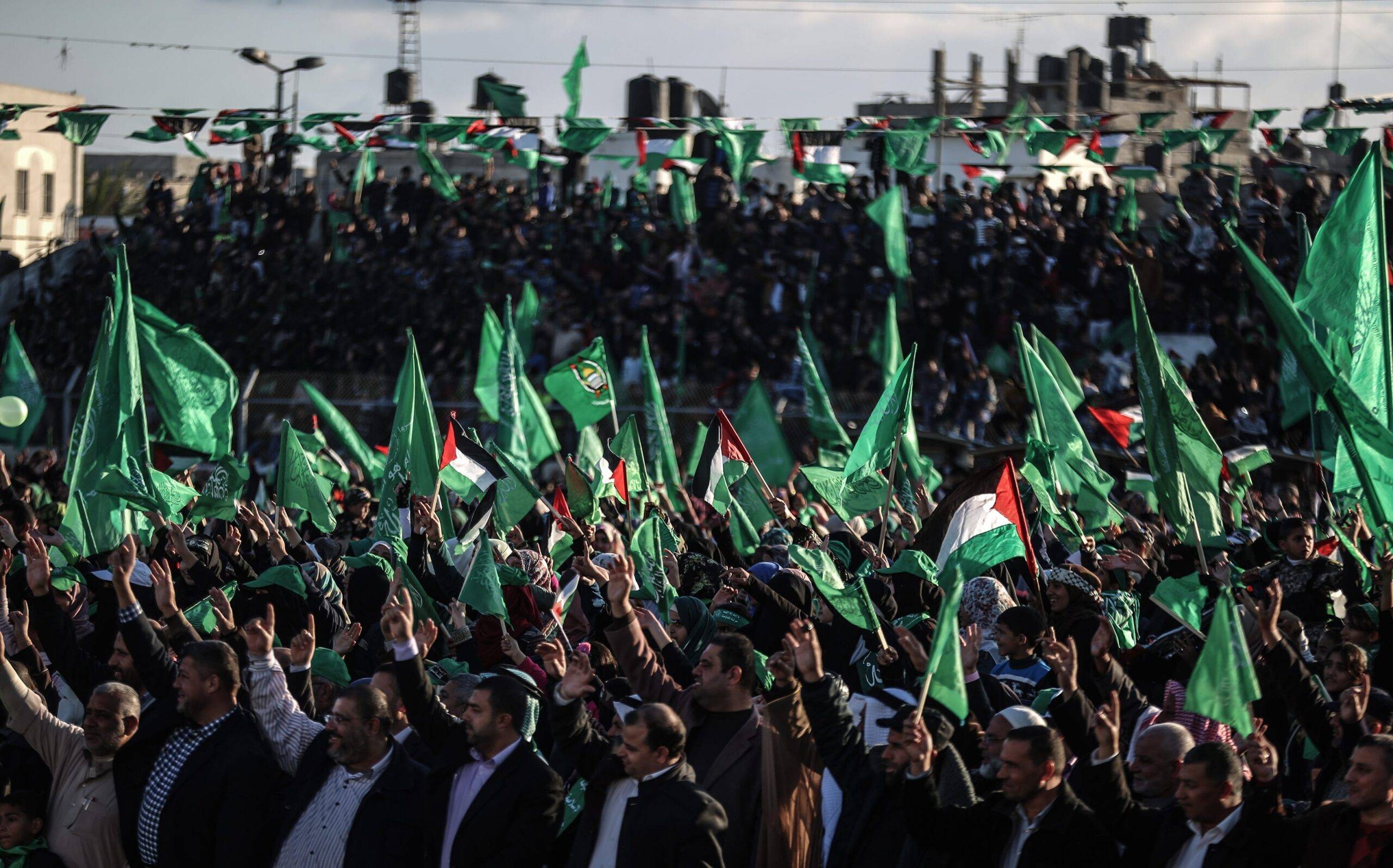 Thousands of people gather to celebrate the 29th anniversary of the foundation of Hamas in Khan Yunis, Gaza on December 11 2016 [Ali Jadallah / Anadolu Agency]