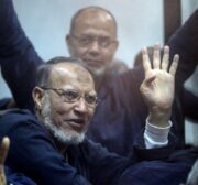 Prominent Muslim Brotherhood leader, Essam El-Erian waves his hand during court in Cairo, Egypt on 26 February 2017 [Moustafa El Shemy/Anadolu Agency]