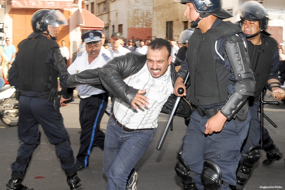 Image of Moroccan police intervening a protest in Morocco [Magharebia/Flickr]