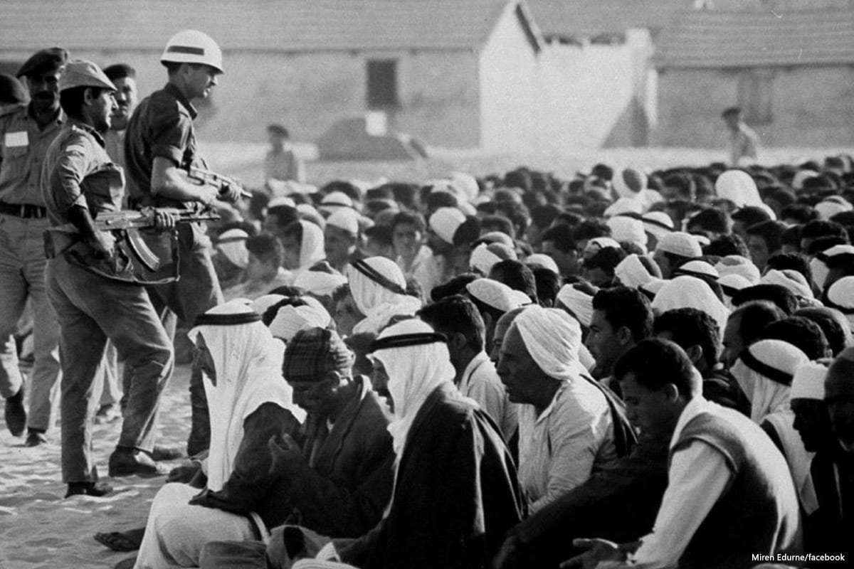 Image of Israeli soldiers interrogating Palestinians during the 1967 Gaza war [Miren Edurne/facebook]