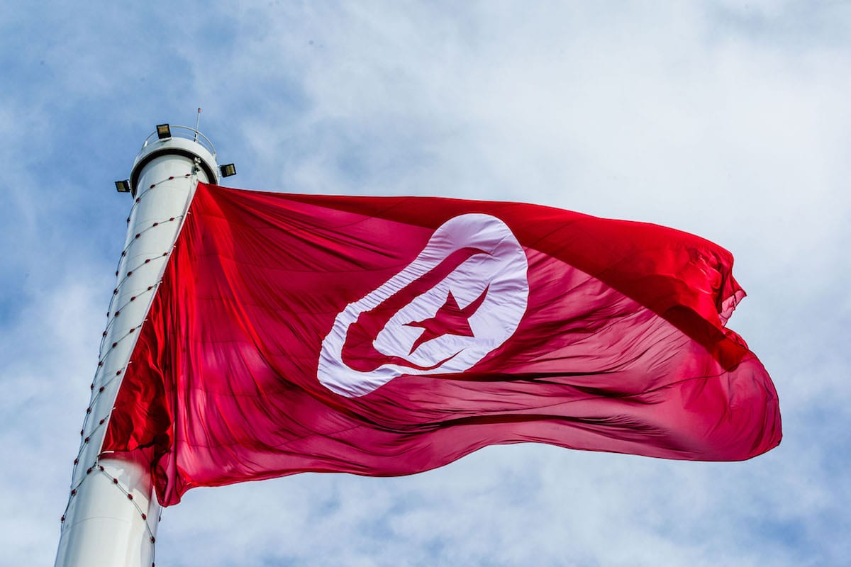 Tunisian flag is raised up to the highest flagpole on the 61st anniversary of Tunisia's independence in Tunis, Tunisia on 20 March 2017 [Amine Landoulsi/Anadolu Agency]