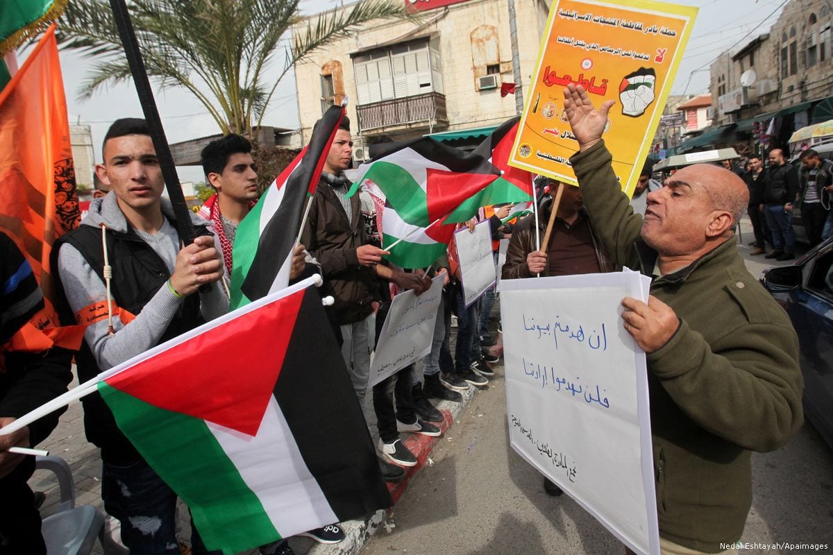 Palestinians take part during a protest against US President Donald Trump's pledge to move the US embassy to Jerusalem on January 25, 2017 [Nedal Eshtayah/Apaimages]