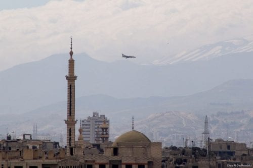 Assad regime forces flies over the region after carrying out airstrikes in Jobar district of Damascus, Syria on March 20, 2017. ( Diaa Al Din - Anadolu Agency )