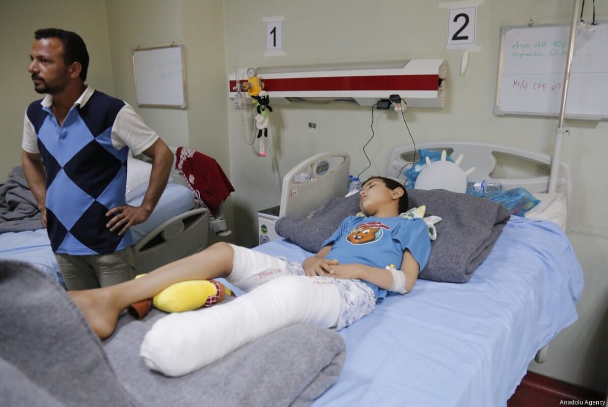 A boy, who has a casted leg, receives treatment at a hospital in Erbil, Iraq on 12 April, 2017 [Yunus Keleş/Anadolu Agency]