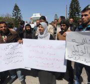 Palestinian Authority employees stage a protest after 30% is cut from their salaries.