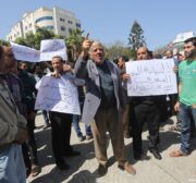 Palestinian Authority employees stage a protest after 30% is cut from their salaries, seen on April, 2017