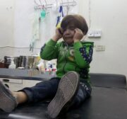 Syrian child receives treatment after Assad Regime forces attacked with suspected chlorine gas in Idlib, Syria on April 4, 2017 (Bahjat Najar - Anadolu Agency )