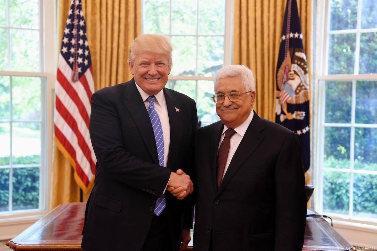 US President Donald Trump shakes hands with Palestinian President Mahmoud Abbas during a meeting in the Oval Office of the White House on 3 May, 2017 in Washington, DC. [Thaer Ganaim/Apaimages]