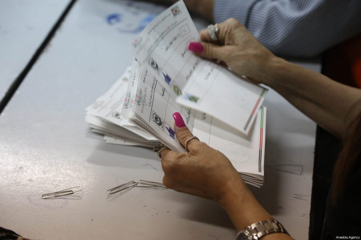 Officials count ballots after Palestinians living in Israel-occupied West Bank voted in the local election, which is boycotted by several Palestinian groups, at the Banat Qasm High School in Ramallah, West Bank on May 13, 2017 [Issam Rimawi / Anadolu Agency]