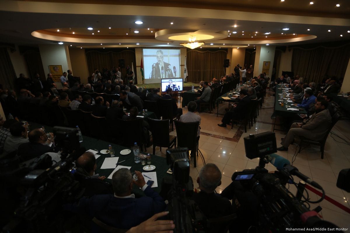 Leaders of Hamas in the Gaza Strip attend a meeting in which they express a new vision of Hamas in Doha, Qatar on March 1, 2017 [Mustafa Hassona/Anadolu Agency]