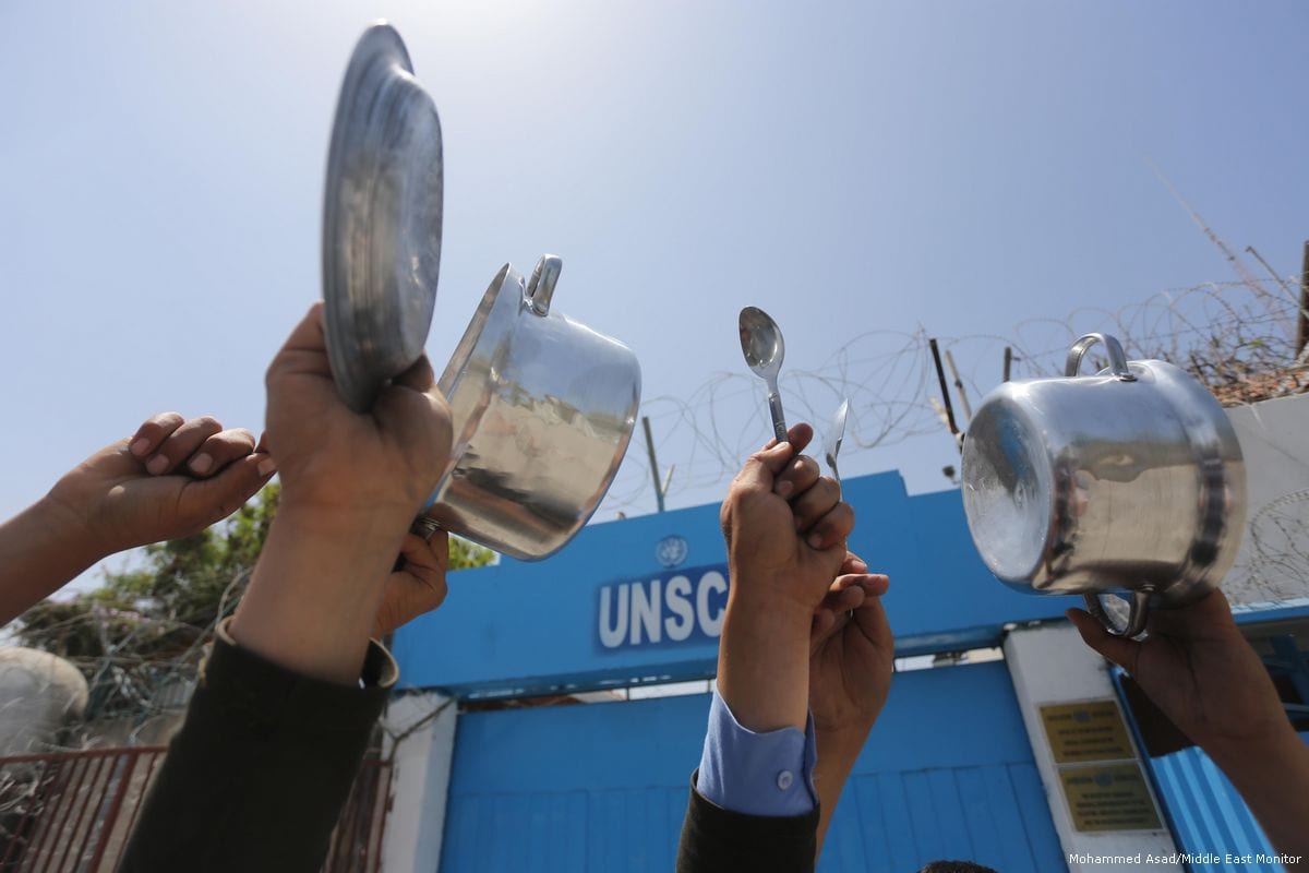 Demonstration outside the UN office in Gaza City on the 23rd day of the Palestinian prisoners' hunger strike on 9 May 2017 [Mohammed Asad/Middle East Monitor]