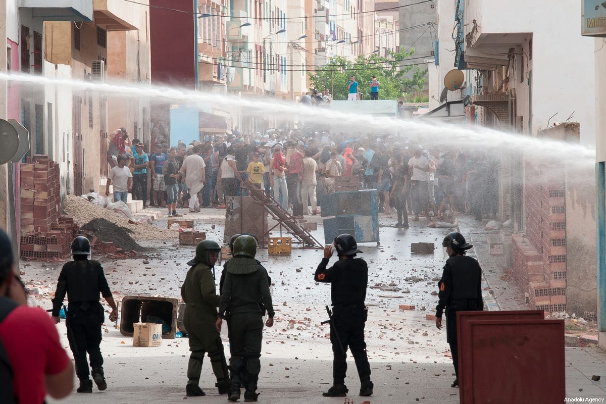 Protesters from Rif movement clash with security forces during a demonstration against government in Imzouren town near Al Hoceima city of Morocco on June 2, 2017 [Jalal Morchidi / Anadolu Agency]