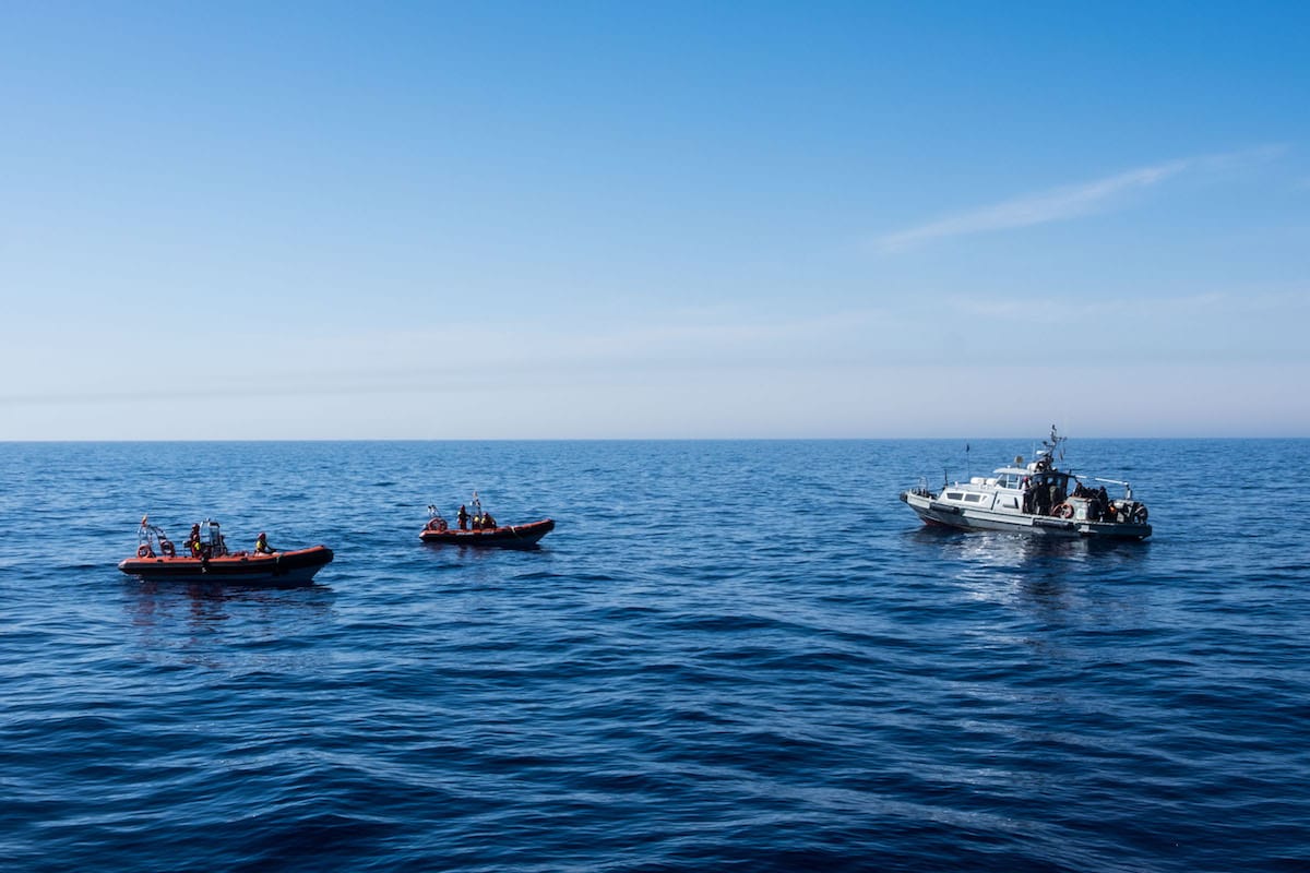 Libyan Coast Guards are seen in the Mediterranean Sea reusing migrants, near Libya [Marcus Drinkwater / Anadolu Agency]