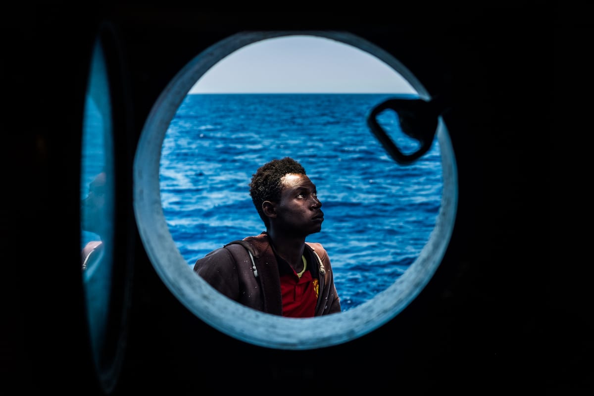 A refugee is seen after being rescued from the Mediterranean Sea on 15 June 2017 [Marcus Drinkwater/Anadolu Agency]