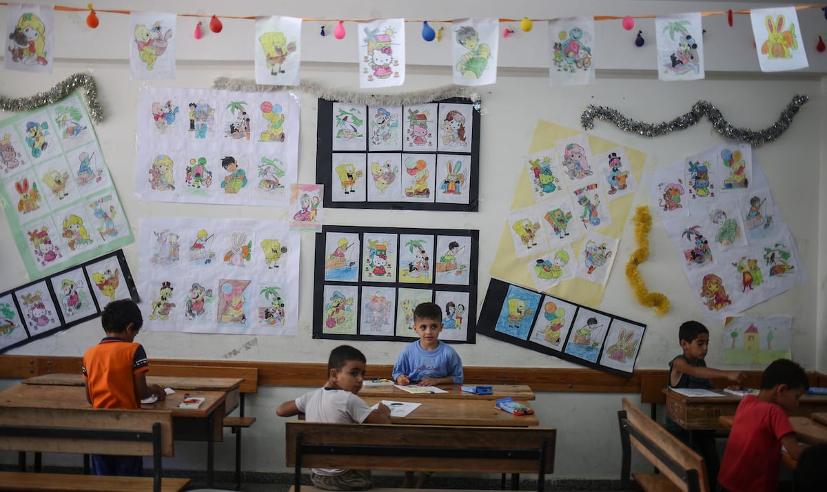 Palestinian students attend activities during a summer camp, organized by the United Nations Relief and Works Agency for Palestine Refugees (UNRWA) at Zaitoun School in Gaza City, Gaza on 18 July, 2017 [Ali Jadallah/Anadolu Agency]