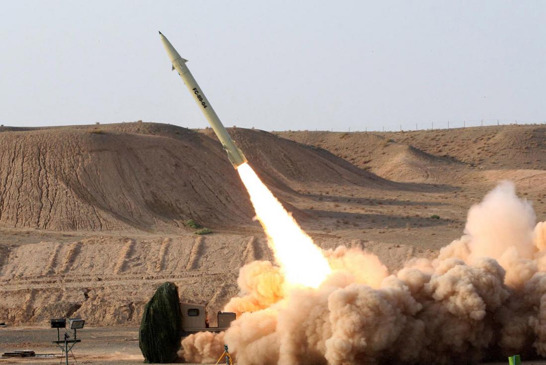 An upgraded version of the short-range surface-to-surface Fateh-110 missile is test fired in 2010 in this photo released by the Iranian Defense Ministry [Vahid Reza Alaei / Iranian Defense Ministry]