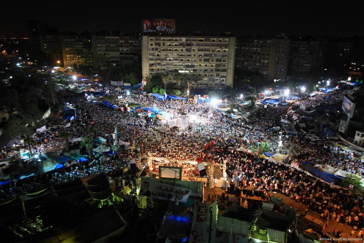 Supporters of the Muslim Brotherhood pray during a protest in support of ousted president Mohamed Morsi, outside Rabaa al-Adawiya mosque in Cairo, Egypt, 29 July 2013 [Ahmed Asad/Apaimages]