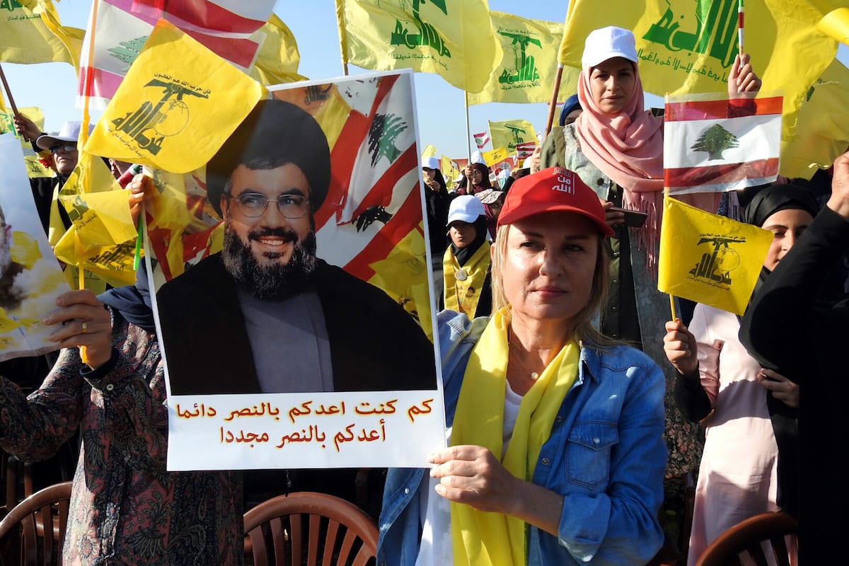 Supporters of the Lebanese Shia movement Hezbollah gather during a speech by Hassan Nasrallah, the Secretary-General of Hezbollah on 13 August 2017 [Ali Dia/Anadolu Agency]