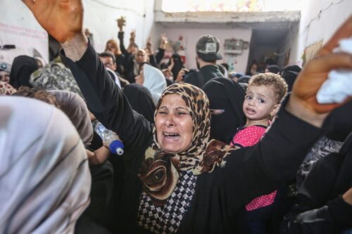 A woman mourns during the funeral ceremony of Nidal al-Jafari, border security officer who lost his life on the suicide attack carried out at Rafah Border Gate, in Rafah, Gaza on 17 August, 2017