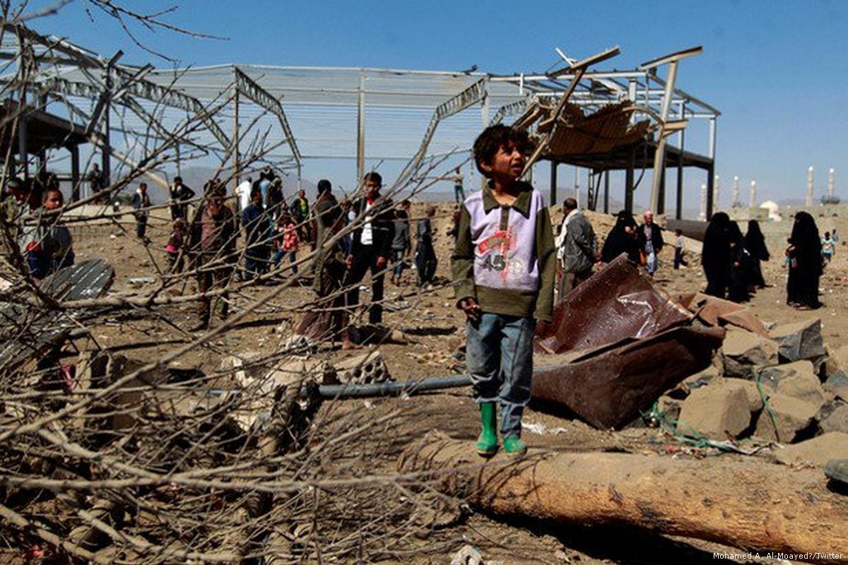 A Yemeni boy looks at the destruction of his home caused by an air strike carried out by the Saudi-led coalition [Mohamed A. Al-Moayed‏/Twitter]