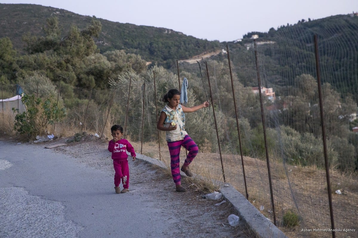 Refugee children play at a makeshift camp in Samos Island of Greece [Ayhan Mehmet/Anadolu Agency]