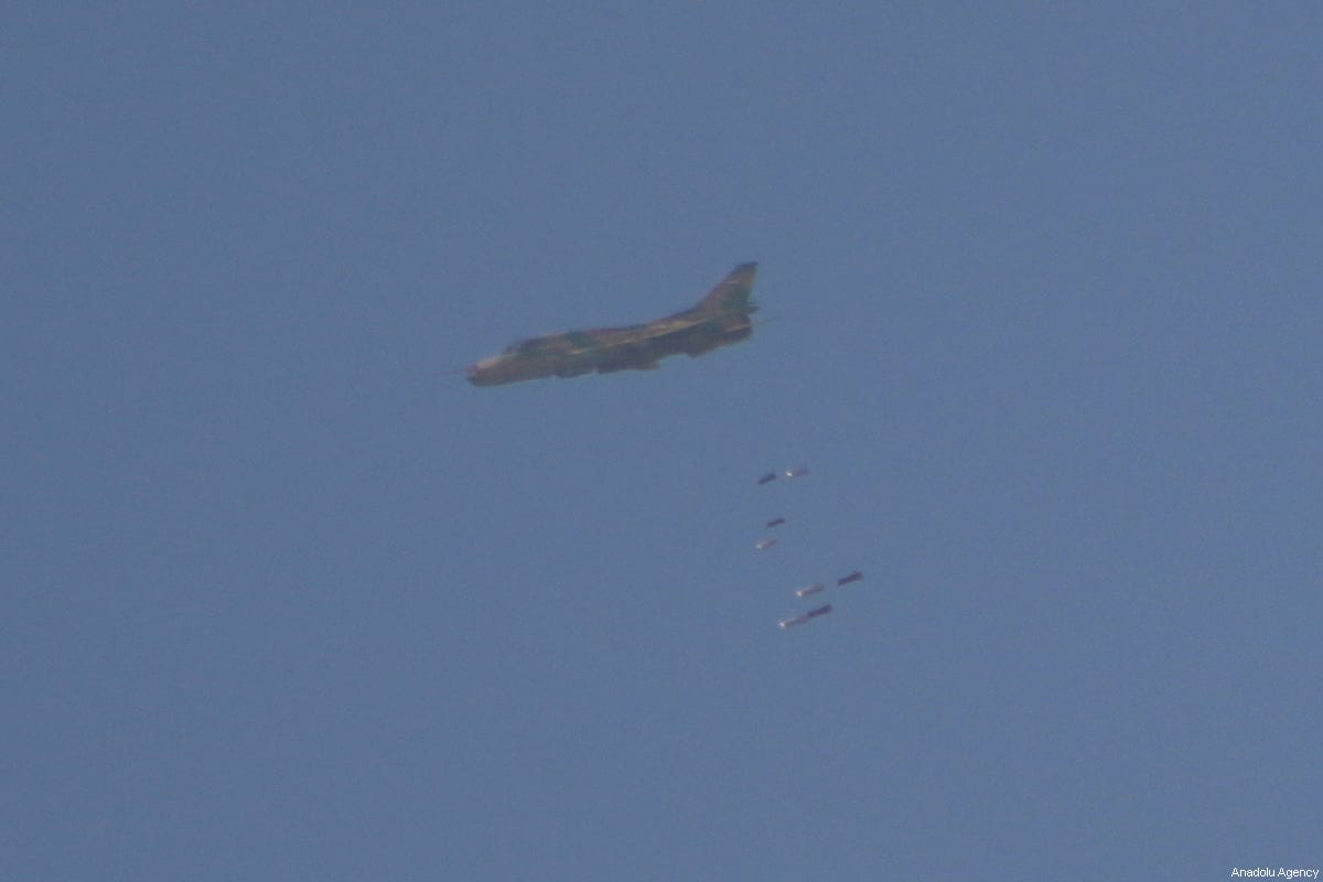 Assad regime's war craft drops bombs during an airstrike over residential areas of Arbin town of the Eastern Ghouta region of Damascus in Syria
