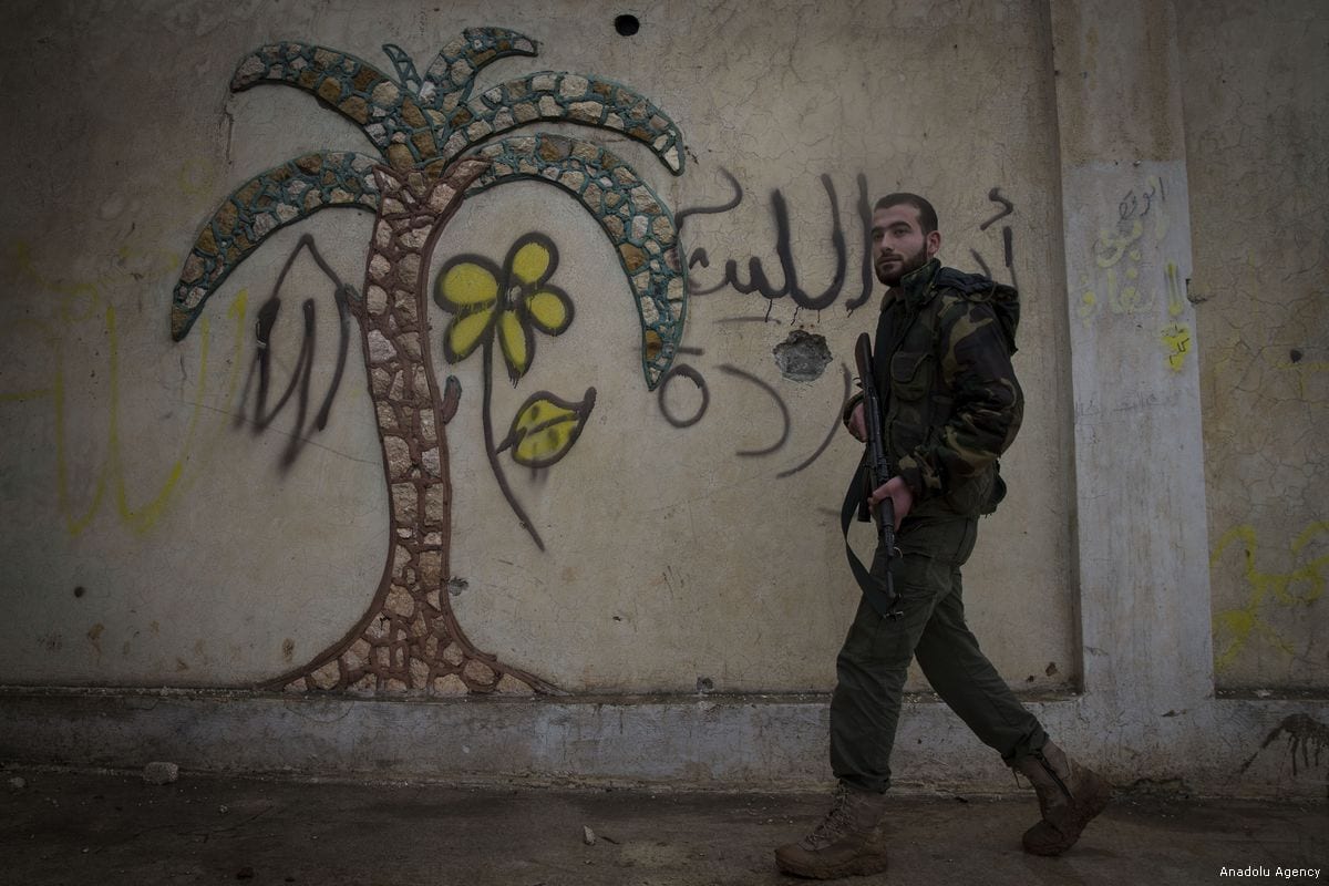 A member of Free Syrian Army (FSA), backed by Turkish Army, patrols in Azez region of Aleppo, Syria within the "Operation Olive Branch" against PYD/PKK in Afrin, on 26 January, 2018 [Emin Sansar/Anadolu Agency]