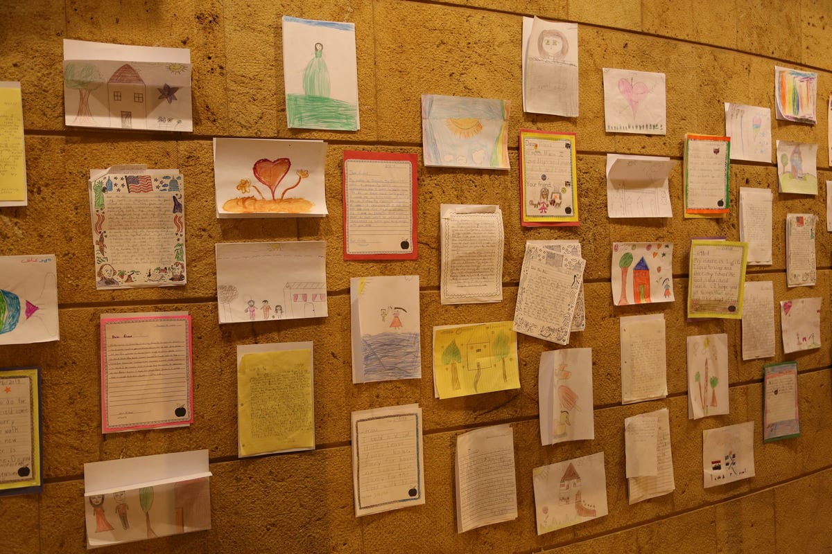 Letters and drawings between young Syrian refugees in Lebanon and kids in New York on display in Beirut, Lebanon, February 16, 2018. Thomson Reuters Foundation/Heba Kanso.