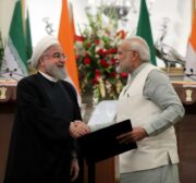 Indian Prime Minister Narendra Modi (R) shakes hands with Iranian President Hassan Rouhani (L) after signing a cooperation agreement between India and Iran in New Delhi, India on February 17, 2018 [Iranian Presidency / Handout / Anadolu Agency]