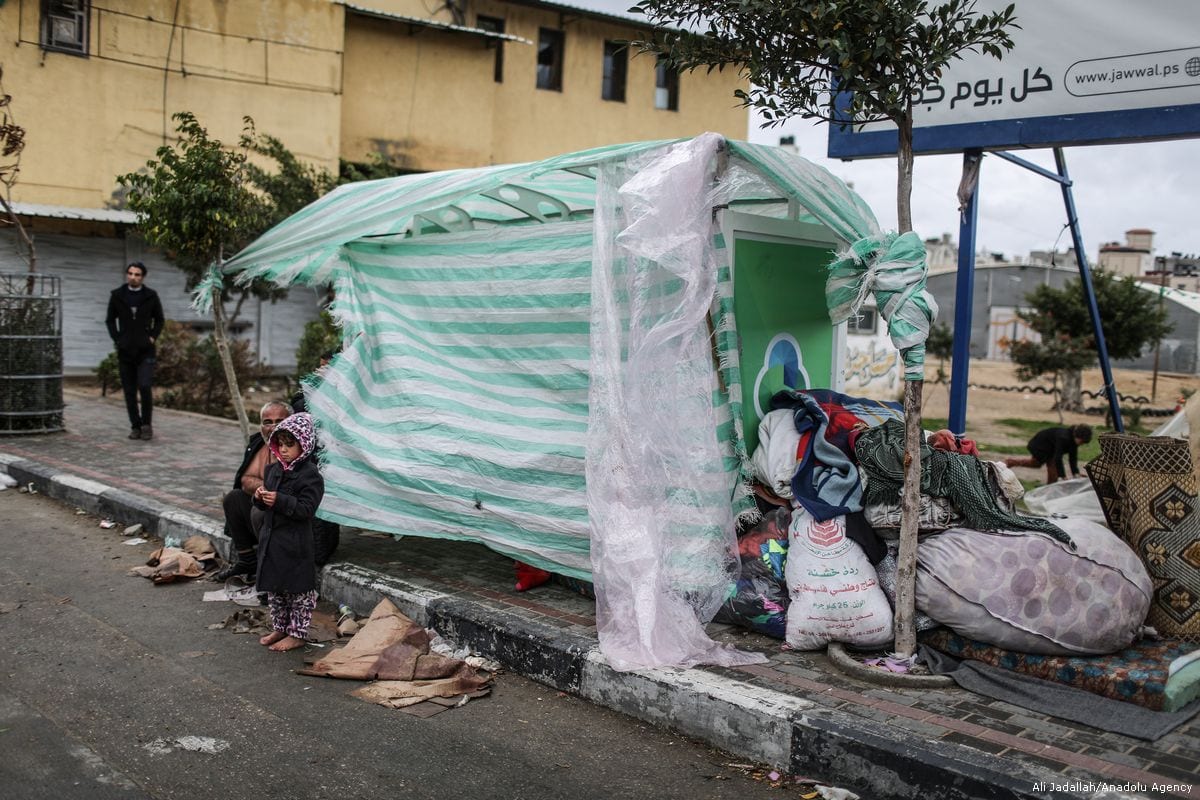 Homeless families take shelter in makeshift tents in Gaza Middle East