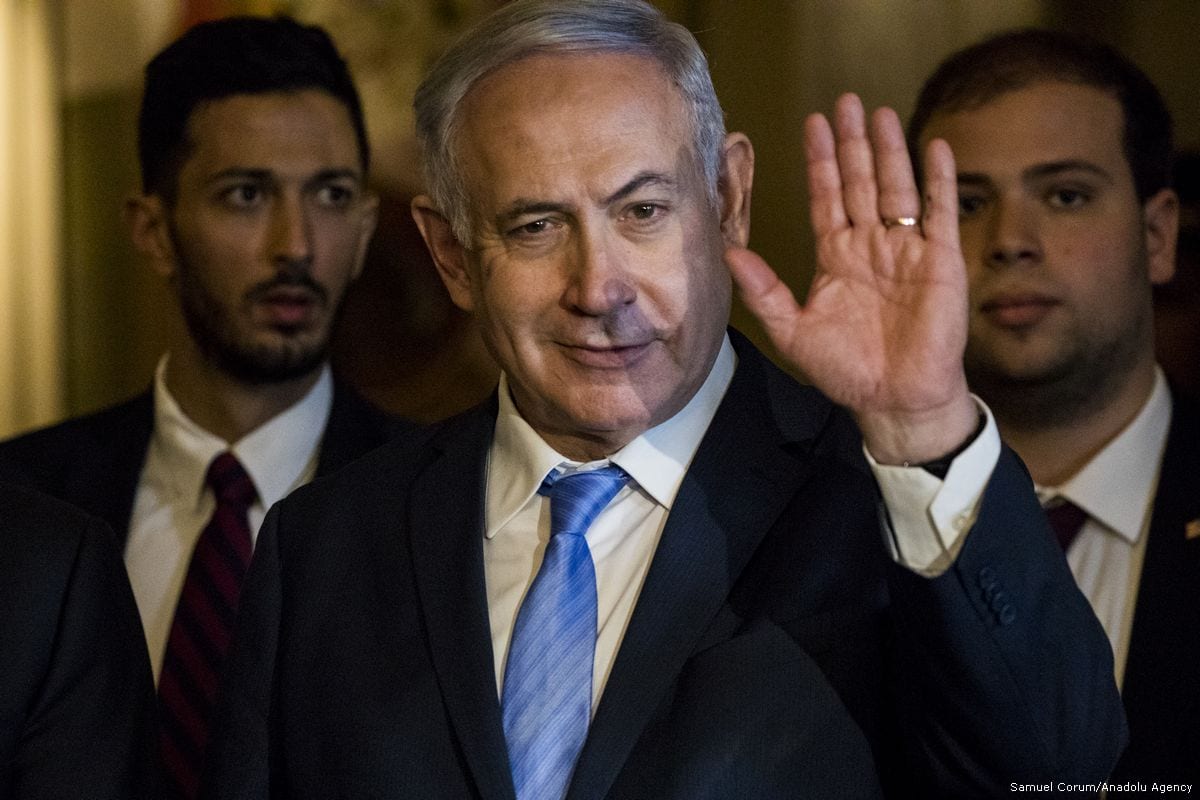 Israeli Prime Minister Benjamin Netanyahu (C) in Washington, US on 6 March 2018 [Samuel Corum/Anadolu Agency]
