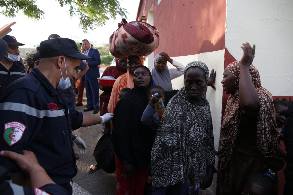 African migrants who were arrested in Algeria while illegally attempting to get to Europe, leave the refugee camp located in the Zeralda region, suburb of the city of Algiers in northern Algeria after Algerian government has started the process of expelling thousands of migrants, on 28 June, 2018 [Farouk Batiche/Anadolu Agency]