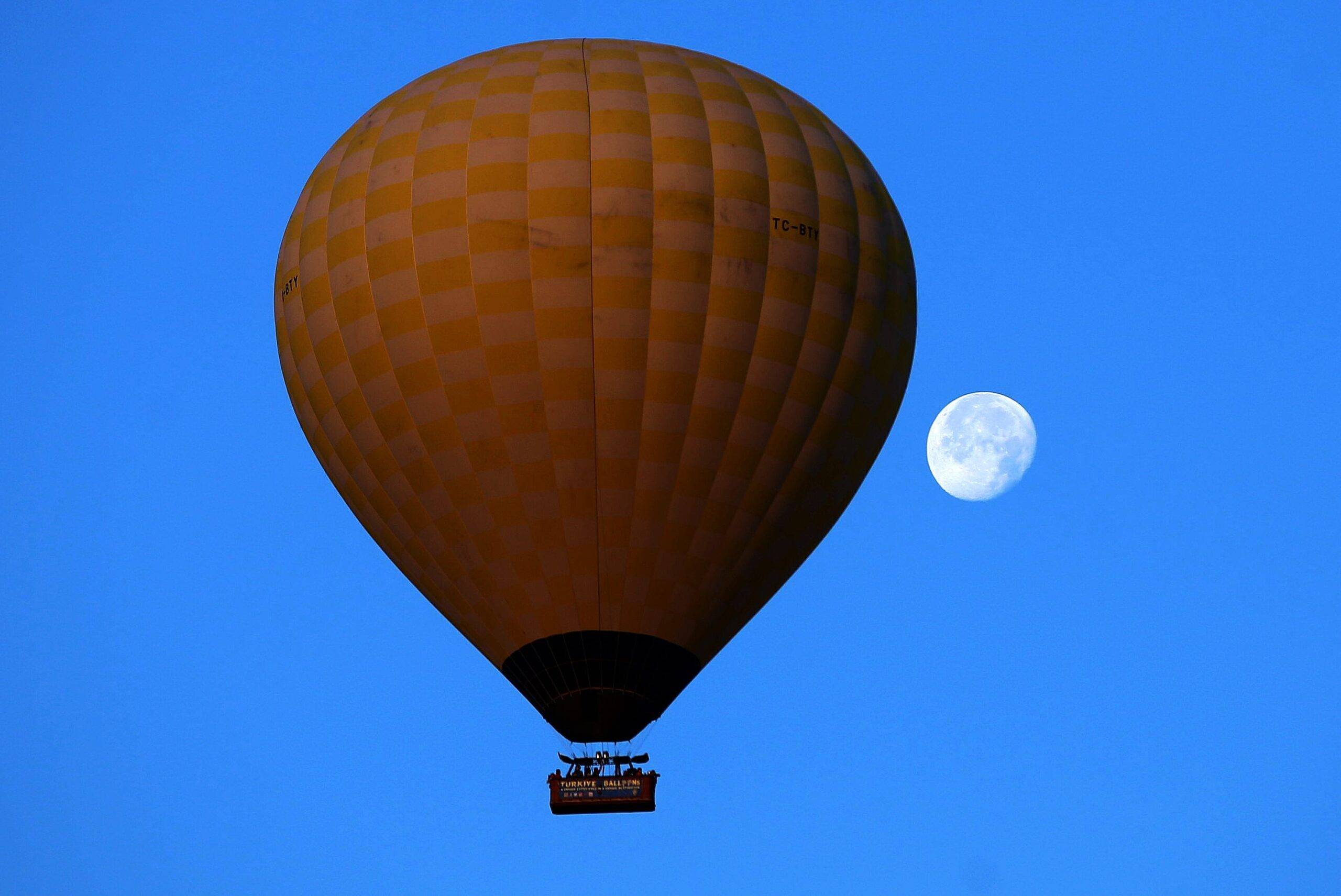Tourists took flights through thermal balloons in the Cappadocia region in Turkey [Behçet Alkan/Anadolu Agency]