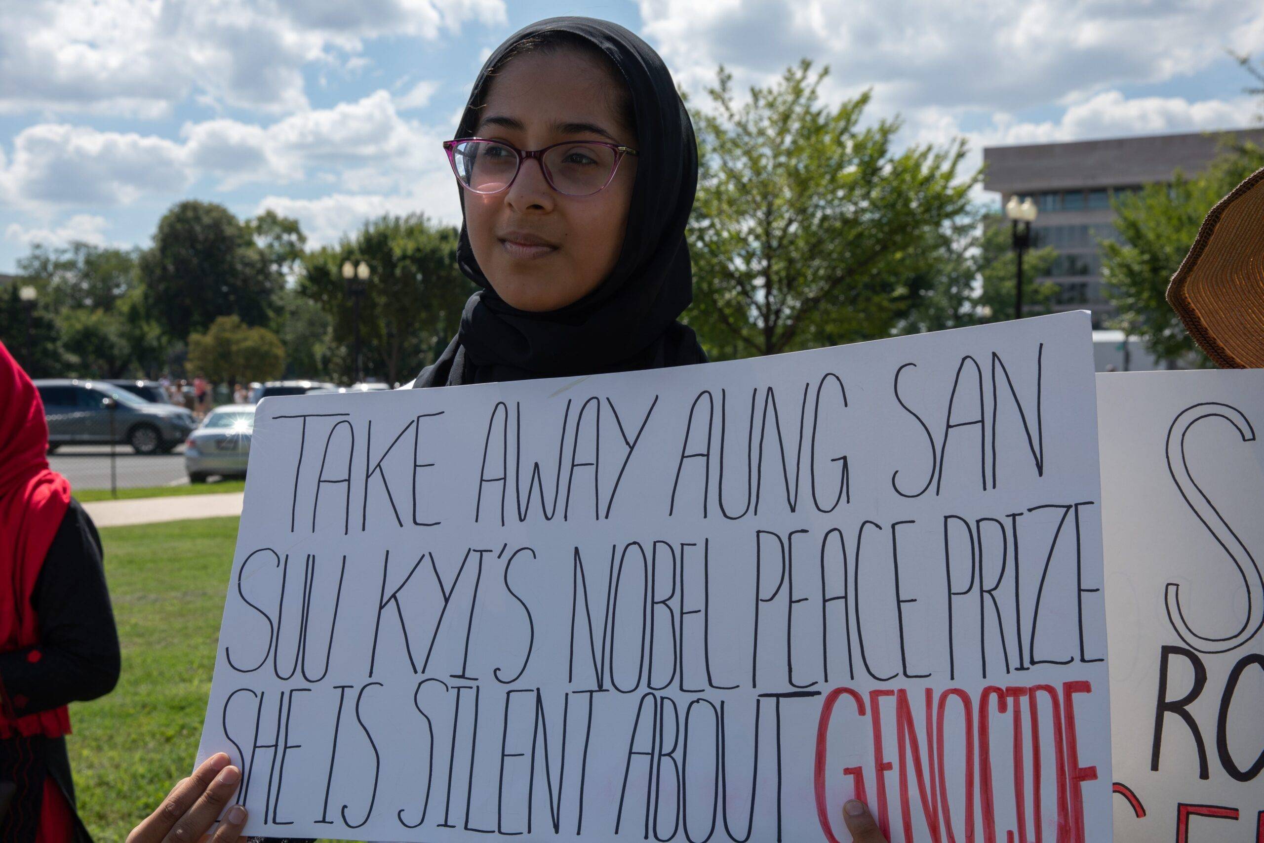 People hold banners as they stage a demonstration near the US Capitol building to protest against massacres carried out by the Myanmar military against Rohingya people one year ago, on 25 August, 2018 in Washington, United States [Yasin Öztürk/Anadolu Agency]