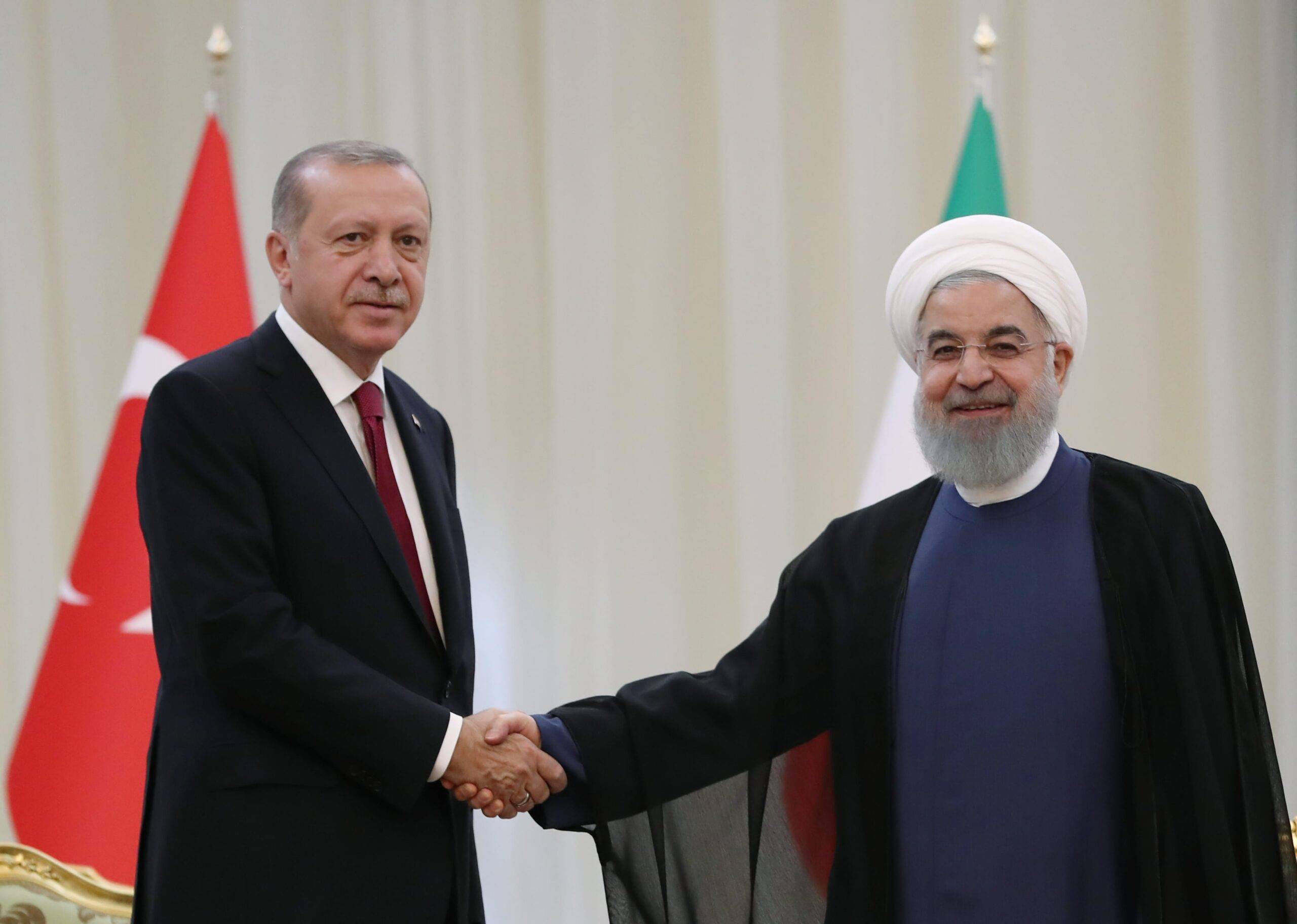 President of Turkey Recep Tayyip Erdogan (L) meets Iranian President Hassan Rouhani (R) ahead of trilateral summit between Turkey, Iran and Russia on September 7, 2018 in Tehran, Iran. ( Kayhan Özer - Anadolu Agency )