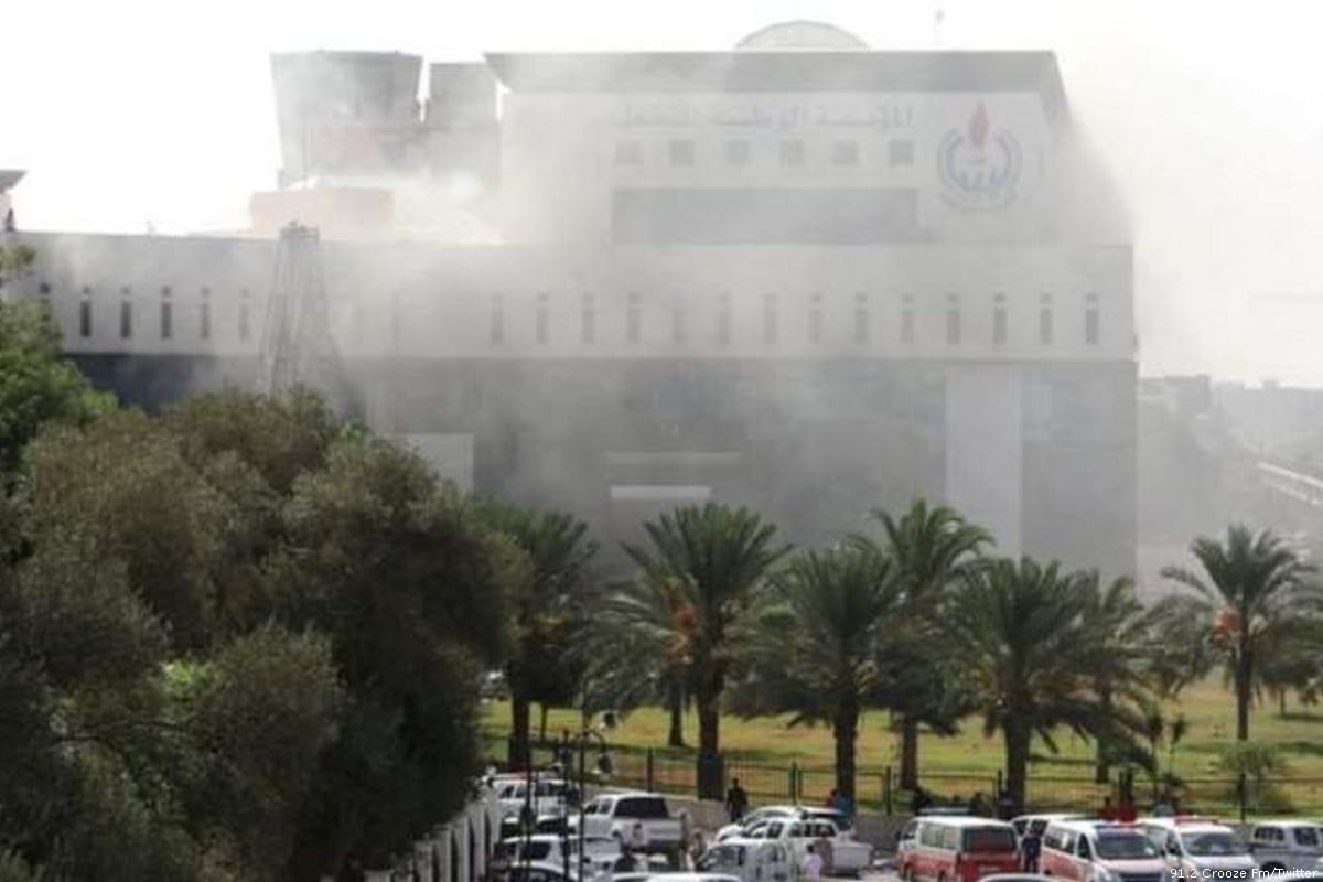 Smoke rises after a militant blew himself up inside the headquarters of Libya’s National Oil Corporation (NOC) in Tripoli, Libya [91.2 Crooze Fm/Twitter]