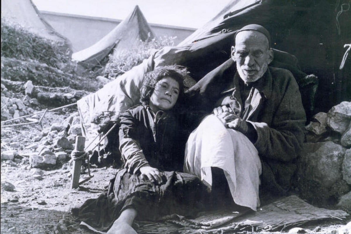 An elderly Palestinian and a child during the Nakba [Hanini/Wikipedia]