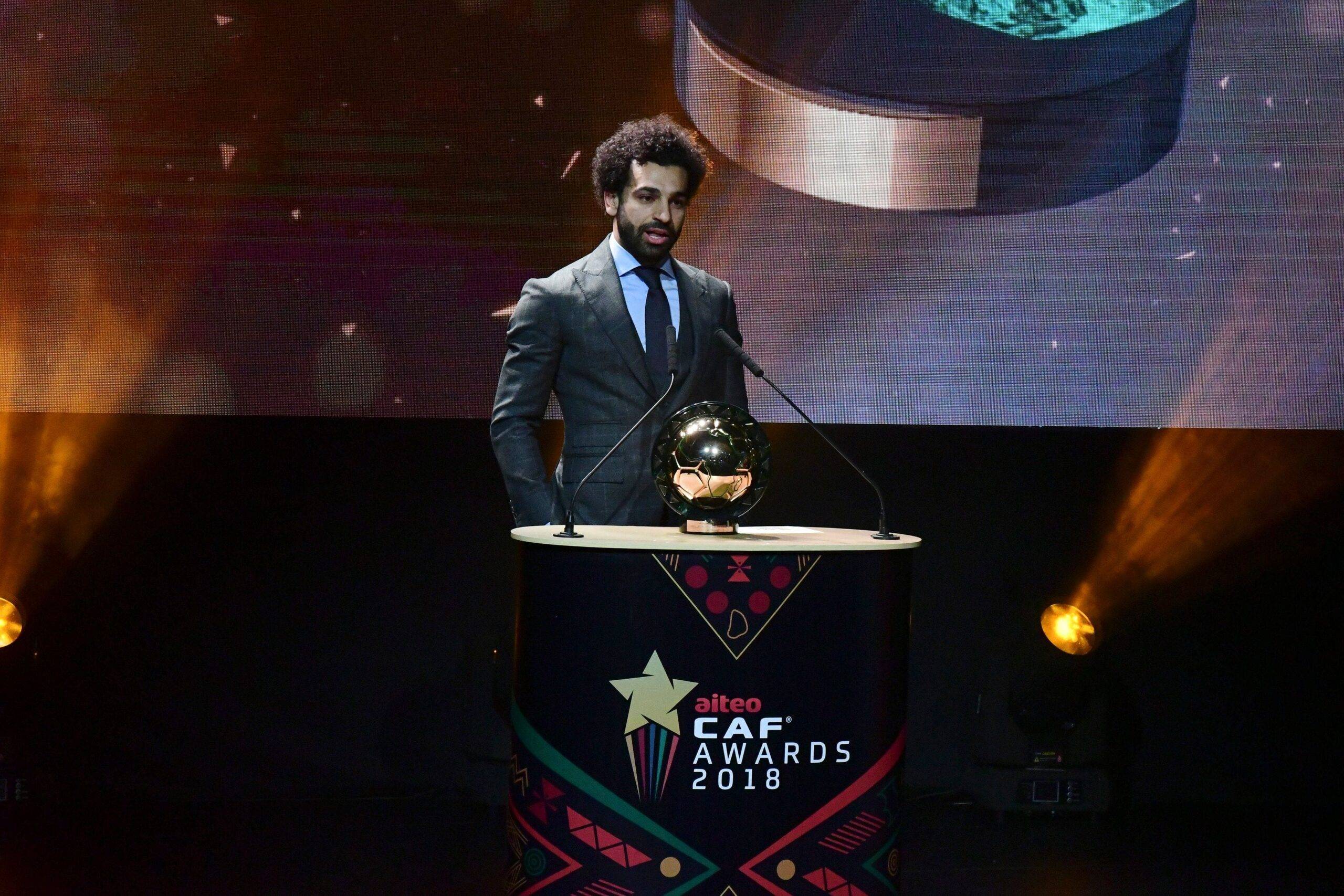 Liverpool's Egyptian forward Mohamed Salah speaks on stage after winning the 2018 African Footballer of the Year Award also called Ballon d'Or during the CAF award ceremony in Dakar, Senegal 8 January 2019 [SEYLLOU/AFP/Getty Images]