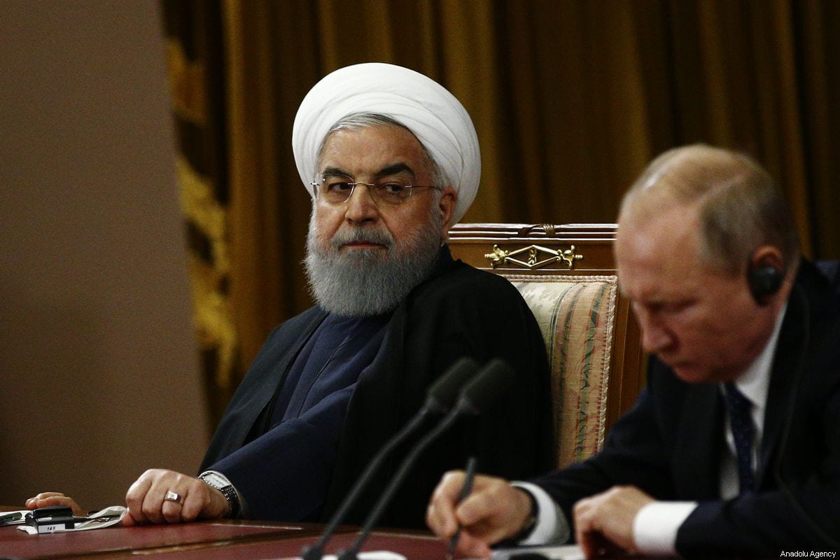 Iranian President Hassan Rouhani (L) , Turkish President Recep Tayyip Erdogan (not seen) and Russian President Vladimir Putin (R) hold a joint press conference following the 4th trilateral summit on Syria on 14 February 2019 in Sochi, Russia. [Sefa Karacan/Anadolu Agency]