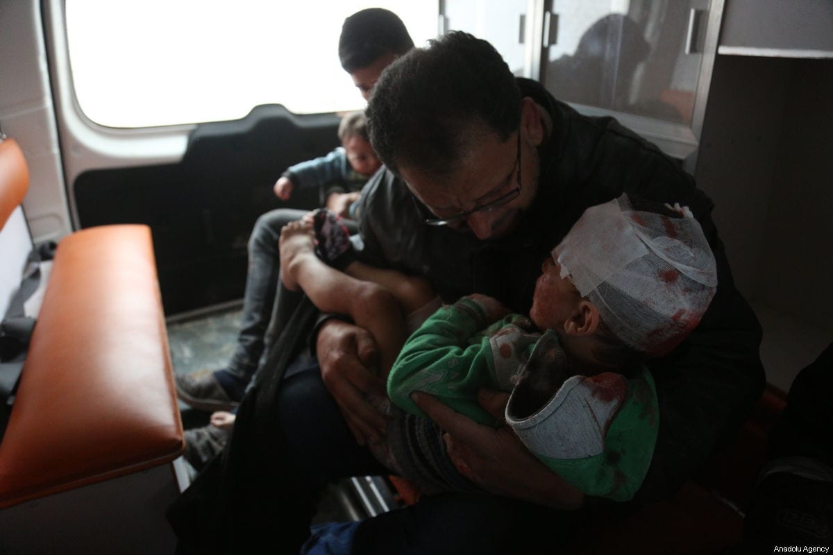 Wounded kids are being taken to hospital with an ambulance after the Assad Regime attacked Idlib, Syria on 16 February 2019 [Enes Diyab/Anadolu Agency]