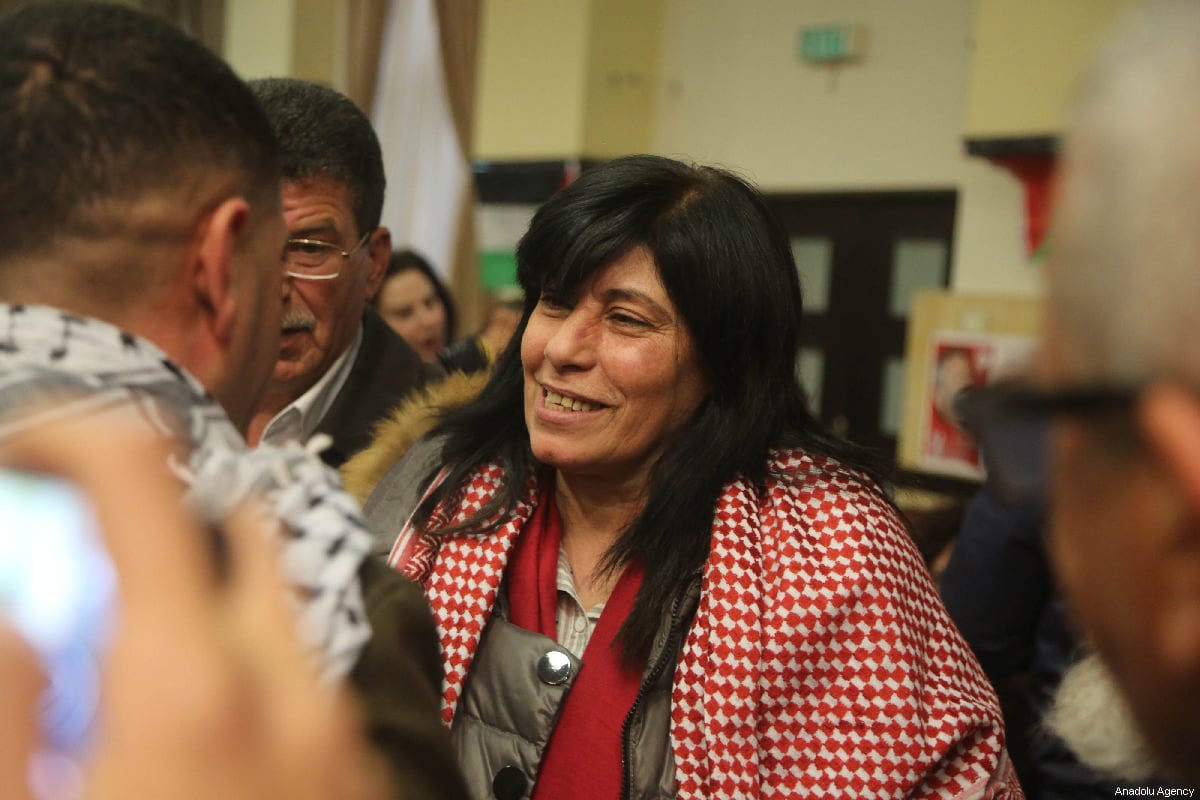 Member of Palestinian Popular Front for the Liberation of Palestine (PFLP) and former lawmaker at the Palestinian Legislative Council (PLC) Khalida Jarrar (C) is seen as she is welcomed by her supporters and relatives after she was released from detention lasted 20 months, at her house in Nablus, West Bank on 28 February 2019. [Issam Rimawi - Anadolu Agency]