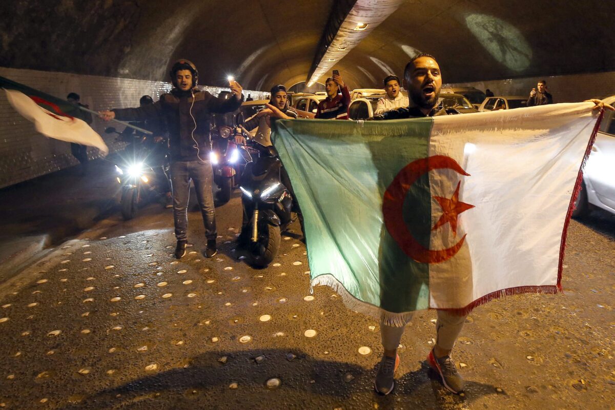 A group of people take the street to celebrate after Algeria’s President Abdelaziz Bouteflika postponed the April presidential election and withdrew his candidacy in Algiers, Algeria on 11 March, 2019 [Farouk Batiche/Anadolu Agency]