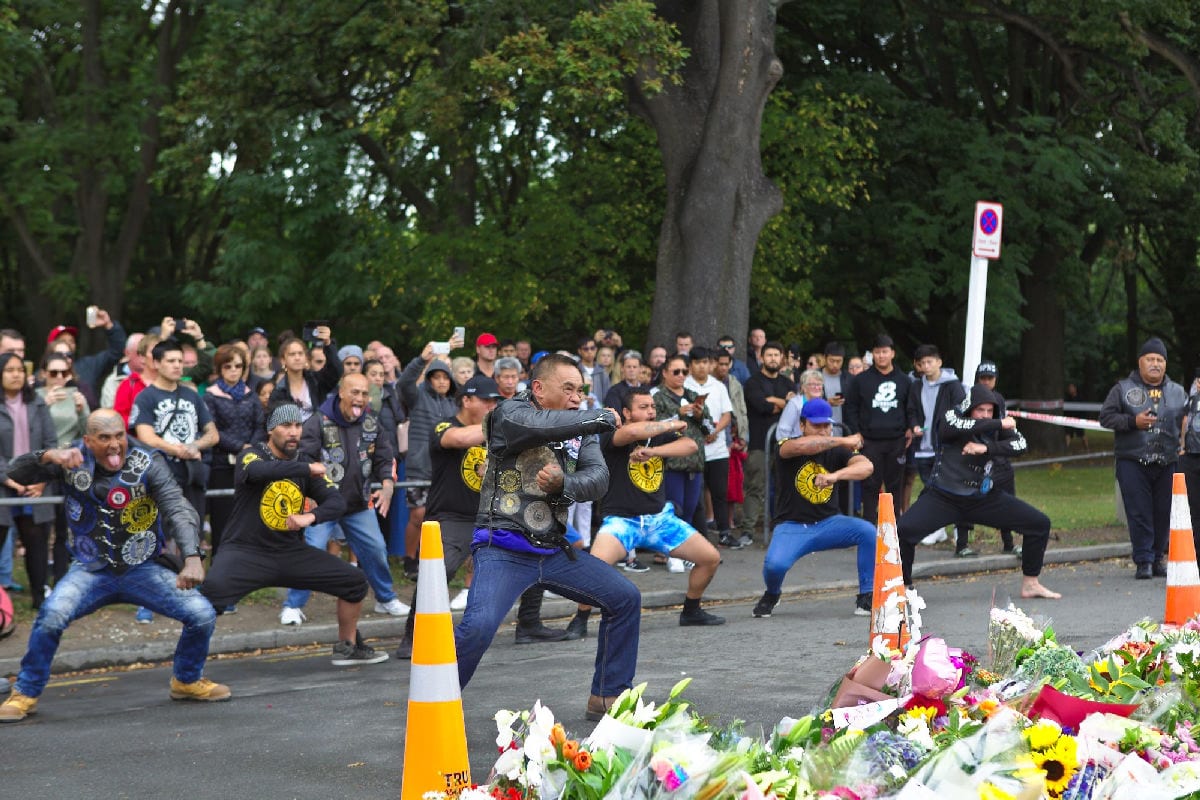 A group of Maori men pay tribute performing a haka in front of the Masjid Al Noor Mosque during a public vigil, close to the shooting area, in Christchurch, New Zealand on 17 March, 2019 [Peter Adones/Anadolu Agency]